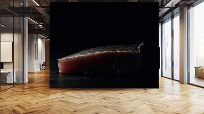 Fresh tuna fish on the table with black background. Generative AI. Wall mural