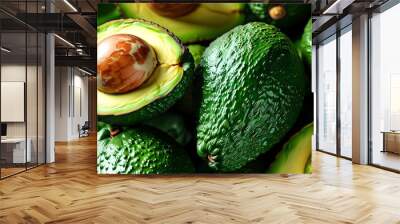 Close-up of a textured green ripe avocado highlighting healthy vegetarian food options Wall mural