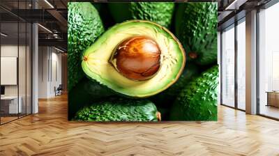 Close-up of a textured green ripe avocado highlighting healthy vegetarian food options Wall mural