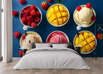 Colorful fruit ice cream in bowls on a vibrant blue background for summer lifestyle promotions and enticing menu designs Wall mural