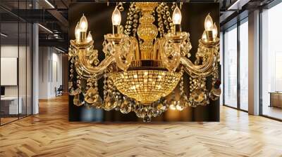 Glistening golden chandelier adorned with dazzling crystals in a vibrant close-up view Wall mural