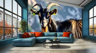 Majestic black goat grazing in lush green pasture Wall mural