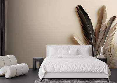 Minimalist arrangement of delicate feathers on a beige background, embodying calm sophistication and ideal for social media graphics Wall mural