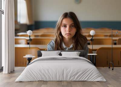 Morning portrait of a teenage girl in a classroom, embracing the excitement of back to school day Wall mural