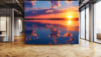 Stunning sunset over a lake with captivating sun reflection shimmering on the water Wall mural