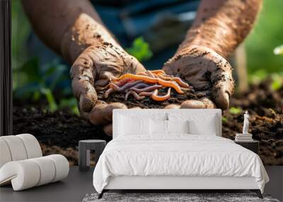 Tender hands nurturing earthworms in fertile soil, embodying sustainability and the essence of healthy agriculture Wall mural