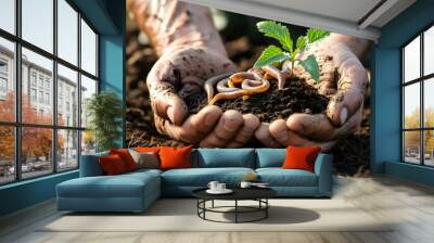 Tender hands nurturing earthworms in fertile soil, embodying sustainability and the essence of healthy agriculture Wall mural