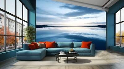 Tranquil blue gradient landscape with calm water reflecting the sky, evoking serenity and peacefulness Wall mural