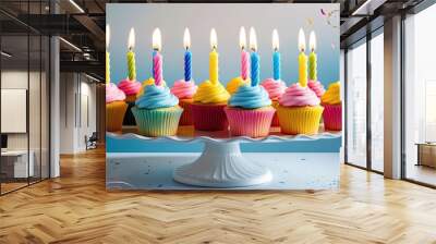 Birthday cupcake with candles on a table
 Wall mural