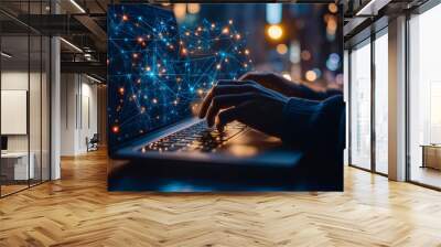 a person typing on a laptop in a dimly lit environment, with digital network connections visualized in blue and orange hues emerging from the screen, symbolizing cybersecurity or data connectivity Wall mural