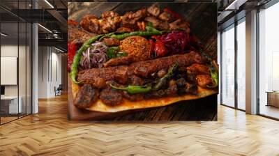 Turkish traditional mixed kebab on wooden plate. Turkish and Arabic Traditional Mix Kebab Plate include Adana, Urfa, Chicken, Lamb, Liver and Beef with thin bread. Tradition food and bread.  Wall mural