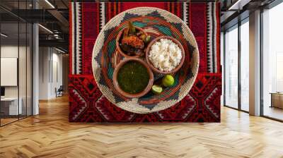 Famous traditional Egyptian cuisine. Molokhia soup with on egyptian background. Flat lay. Moroheiya, Mulukhiya Wall mural