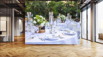 Romantic Wedding Table Top Layout Table Spread no people tropical location with gold cutlery white table cloth and scenic view of sunset with copy space tablescape, beautiful paradise setting Wall mural