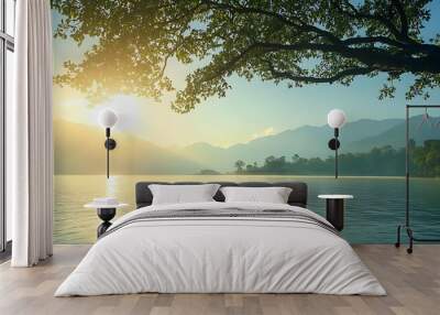 A serene, lakeside view at sunrise with a large clear sky area for text Wall mural