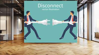 two businessmen disconnection electric plug. disconnect concept. conflict cooperation. disagreements Wall mural