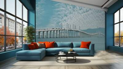 Long  bridge on a background of cloudy sky in Macau, China Wall mural