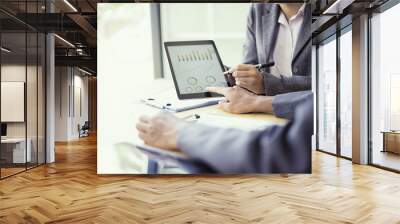 Business people analyzing investment charts with teblet in meeting room, Accounting concept Wall mural