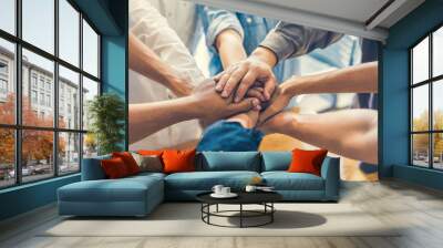 business people making pile of hands Wall mural