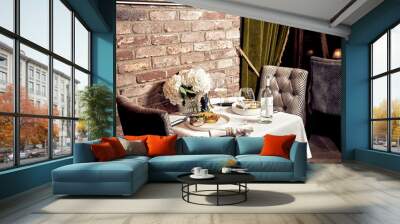 Set for two of seafood for dinner, Grilled shrimps or prawns served with lemon, garlic and sauce Wall mural