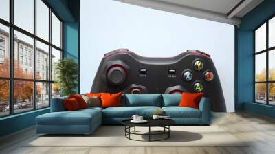 Two joystick gaming controller on light blue background. Minimalism. Wall mural