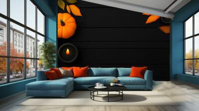 ozy autumn arrangement with orange candles, pumpkin, and colorful fall leaves on dark background perfect for Thanksgiving, Halloween, or seasonal greeting card designs Wall mural