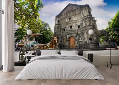 horse drawn carriage parking in front of malate church , manila philippines. Wall mural