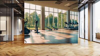 Modern fitness class interior with sport equipment in row and bright panoramic windows Wall mural