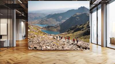 People walking up Mount Snowdon in Wales Wall mural