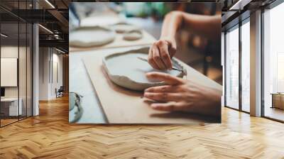 Closeup Image of Female Hands Works with Clay Makes Future Ceramic Plate, Professional Ceramic Artist Makes Classes of Hand Building in Modern Pottery Workshop, Creative People Handcrafted Design Wall mural