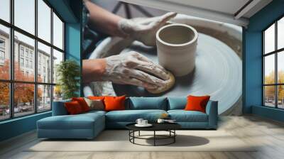 Closeup shot of female ceramic artist works on pottery wheel in studio space, Creative People Handcrafted Ceramic Design Art Skill Wall mural