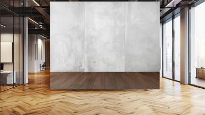 Modern room with empty gray concrete wall and brown wood floor. Interior in loft style.  Wall mural