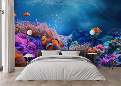 Clown fish swimming on anemone underwater reef background Wall mural