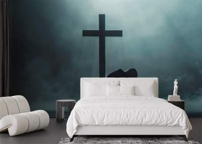 Man praying in front of a cross with copy space. Man praying in front of a cross with copy space Wall mural