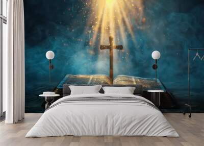 Open holy Bible book with christian cross and rays of ligh Wall mural