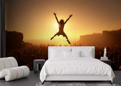 Epic party concept with man jumping high up from crowd of dancing people Wall mural