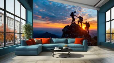 Group of young hikers with backpacks walks with backpacks and helps each other in climbing in sunset mountains Wall mural