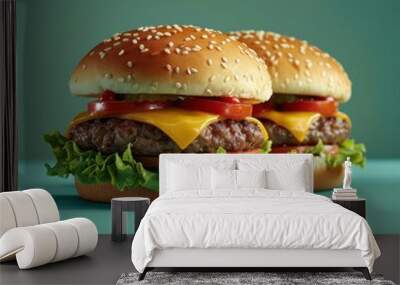 Two Cheeseburgers with Lettuce and Tomato on a Teal Background Wall mural