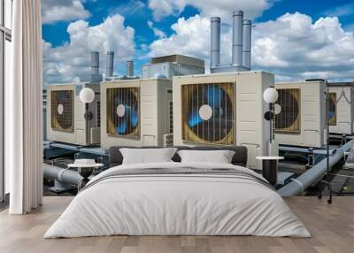 Industrial chiller air conditioner condenser units on rooftop with blue sky. HVAC background concept. Wall mural