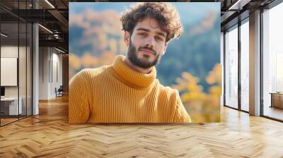 Stylish Man Posing Energetically in a Sweater Set Wall mural