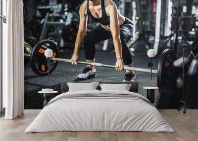 fit woman make sport exercise with barbell. Wall mural