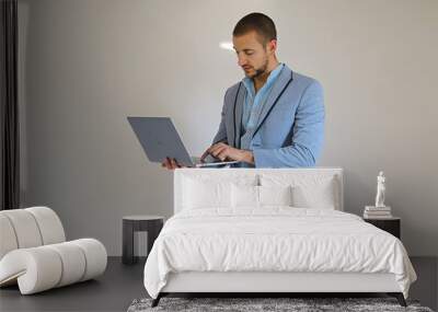 Home office Young man is working from home Wall mural