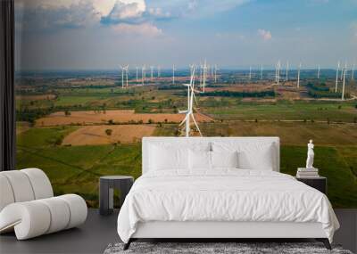 Wind turbine farm and agricultural fields. aerial shot Wall mural