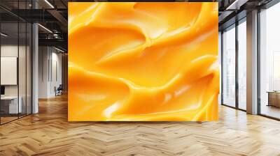 a close-up, top-down view, texture background of mango puree filling the frame with its vibrant orange-yellow color and smooth texture Wall mural