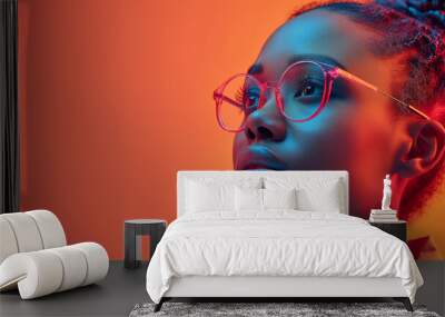 woman with glasses looking up, orange background, health care concept graphic, large copy space on the right side, banner design. the stock photo is well lit. in the style of unsplash photography Wall mural