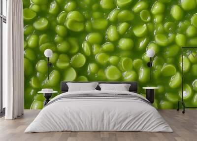 a close-up, top-down view, texture background of fava bean jam spread across the entire frame, filling the image with its bright green color and smooth texture Wall mural