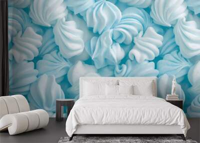 A cute and dreamy, soft and pastel tones, aesthetic background of close-up of soft shaped pastel blue marshmallow, each piece showcasing its fluffy texture and light sugar dusting Wall mural