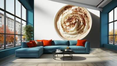 a hot chocolate with whipped cream and a sprinkle of cocoa powder against an isolated white background Wall mural