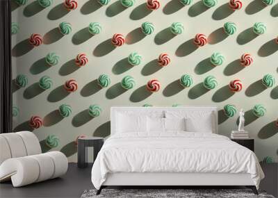 A pattern of complementary mint candies arranged in an orderly fashion on the soft white background, with shadows cast sunlight Wall mural