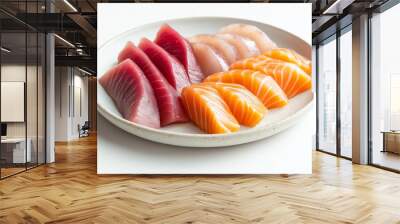 a plate of sashimi with various fish cuts including salmon, tuna, and yellowtail against an isolated white background Wall mural