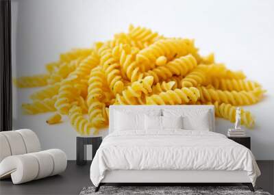 fusilli with pesto with fresh basil pesto, pine nuts, and grated parmesan against an isolated white background Wall mural